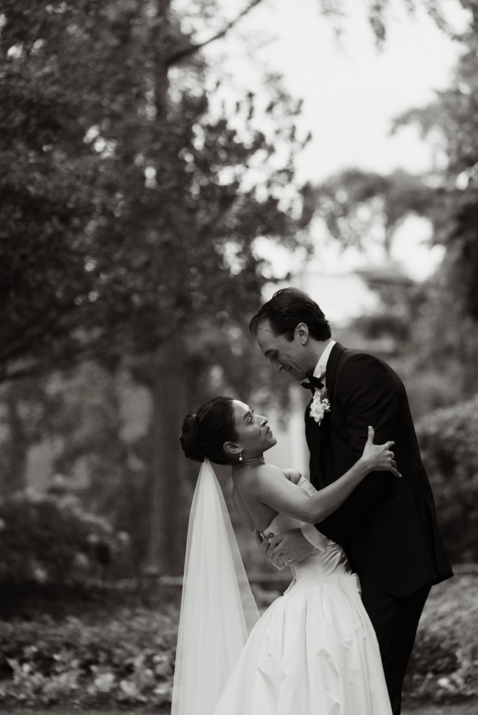 bride and groom looking at each other after their first kiss at the altar during their wedding ceremony