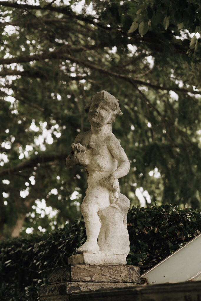 greek inspired statue at meridian house wedding venue