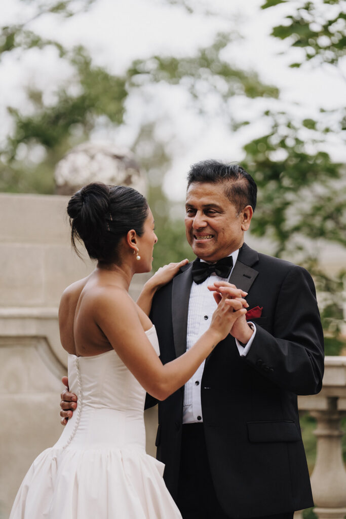 a father-daughter dance at a wedding